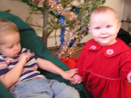 Noah and Sarah at home under our tree.