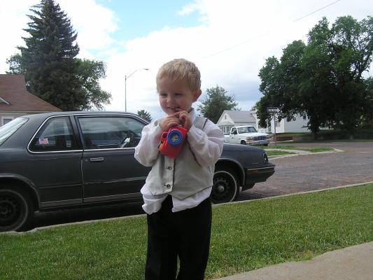 Noah plays with a camera .