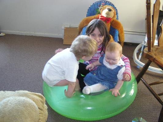 Noah Andrea and Sarah play that they are in a giant donut.