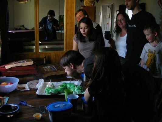 David blows out candles.