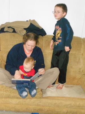 Katie reads Joshua his new book with Noah