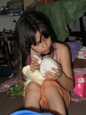 Malia feeds Sarah's baby.