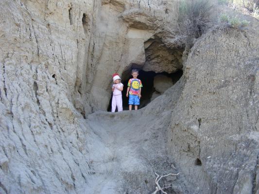 Sarah and Noah in a little cave.