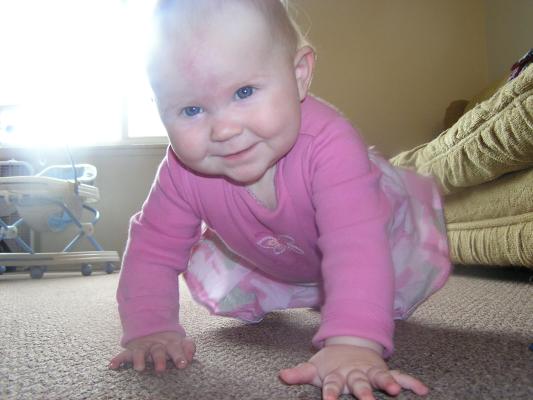 Sarah is crawling.