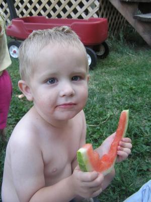 Noah eats some watermelon.