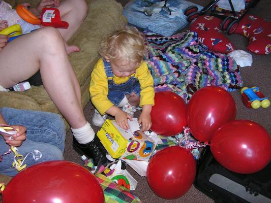 Noah rips some Seseme Street paper.