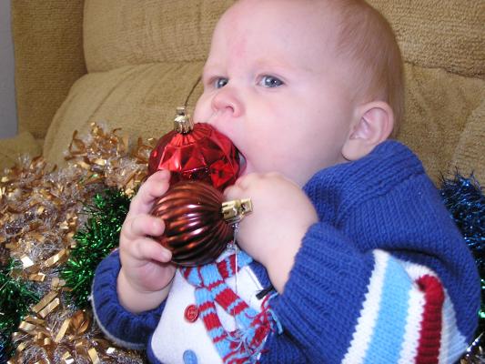 Sarah is eating Christmas Balls.