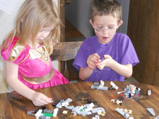 Sarah and Noah play with Star-Wars legos, one of Noah's Christmas gifts. 