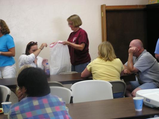 Cleaning up after the potluck.