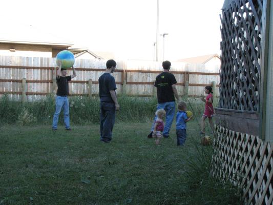 Matthew, Jim, Mike, Sarah, Noah and Malia play ball.