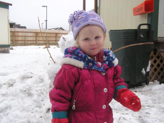 Sarah plays in the snow.