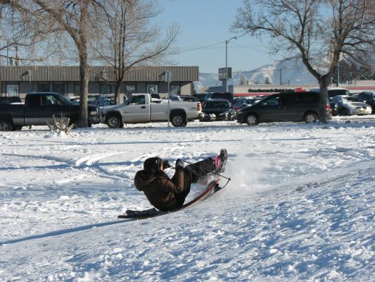 Malia sledding.