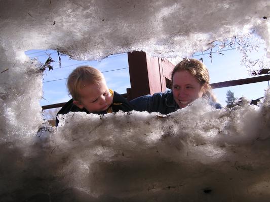 Noah and Katie inspect the window created by melting.