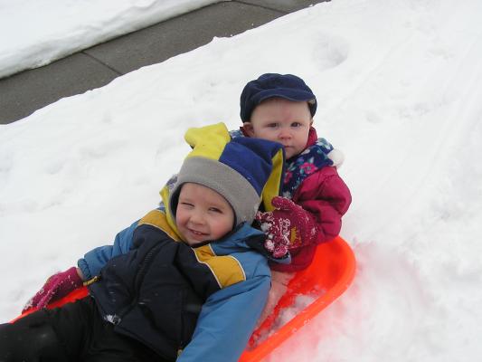 Noah and Sarah in the sled.