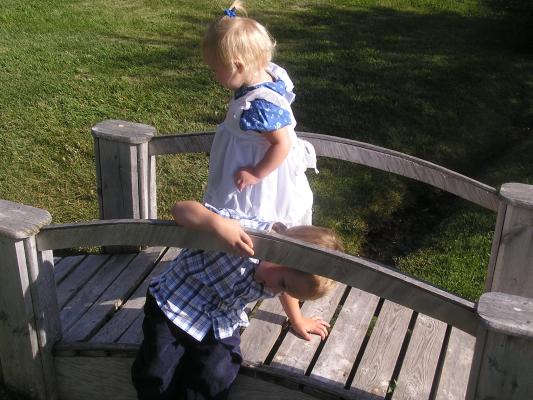 Sarah and Noah play on a little bridge