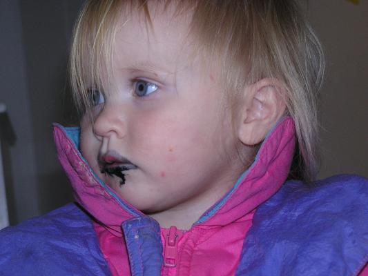 Sarah tried to eat a black marker
