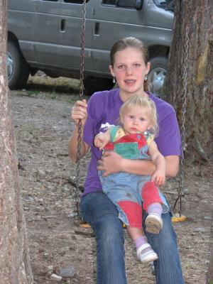 Sarah with a Pinehaven girl swinging.