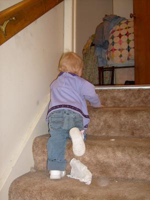 Sarah climbs the stairs