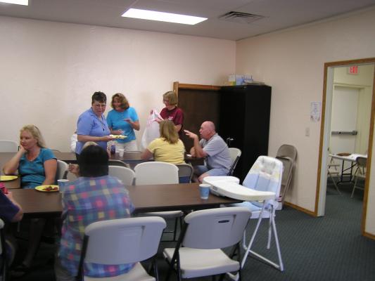 Cleaning up after the potluck.
