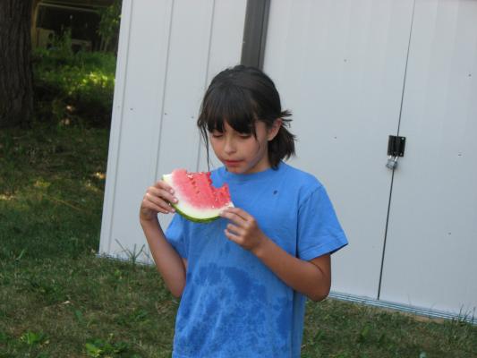 Malia eats watermelon