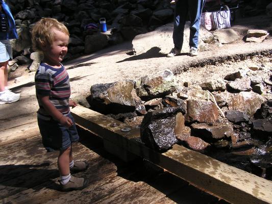 Noah knocking in some rocks at Palisade falls