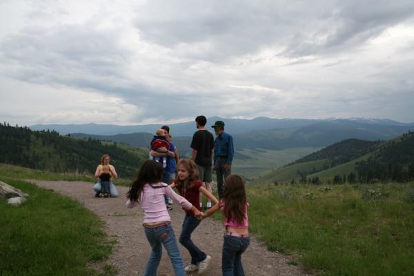The girls play on the trail.