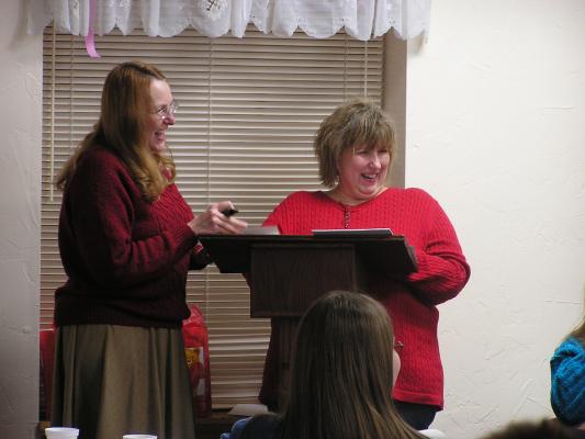 Kathy Fisher and Kim Miller hosted the Valentines Married Game.