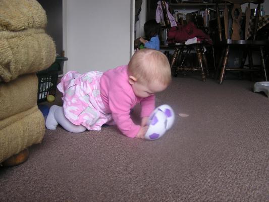 Sarah got distracted by some toys.
