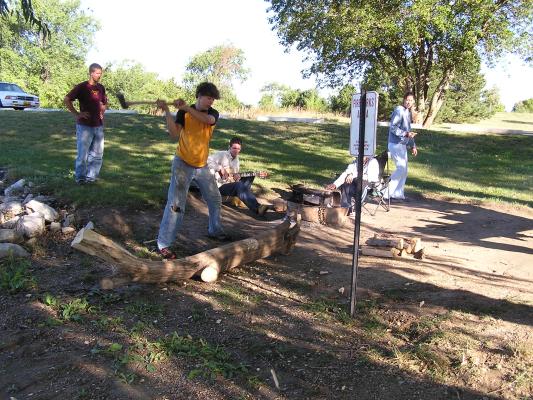 Christian Student Fellowship campout.
Chopping wood for the fire.