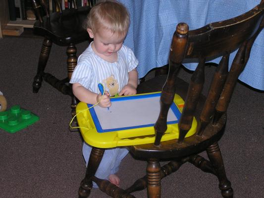 Noah draws on his magnadoodle