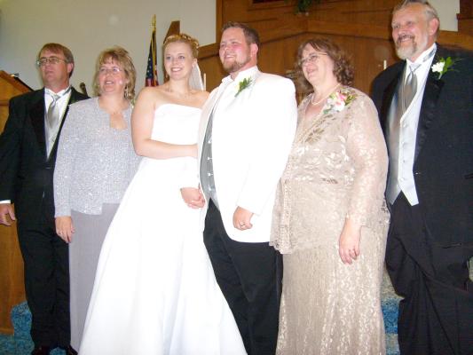 Titus and Jaimee with the parents. Titus's parents are WAlt and Mary Cline. Jaimee's mom is Trish