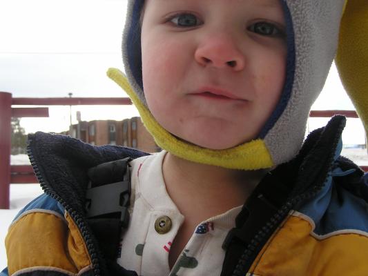Noah stays warm in his hat.