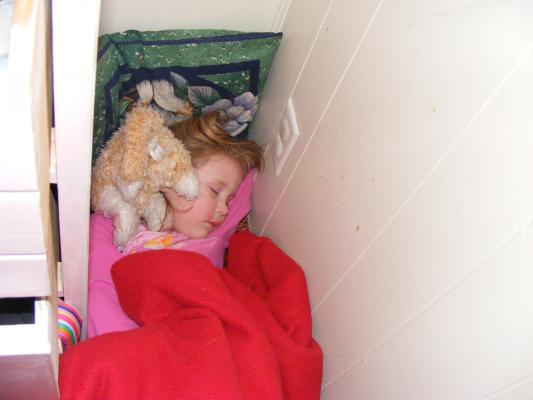 Sarah squashed into a little corner by her vent and falling asleep. 