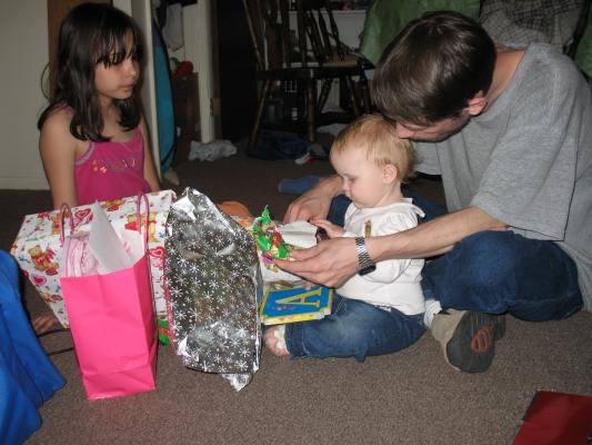 Sarah doesn't really care about the presents.
She wants to read the A book.