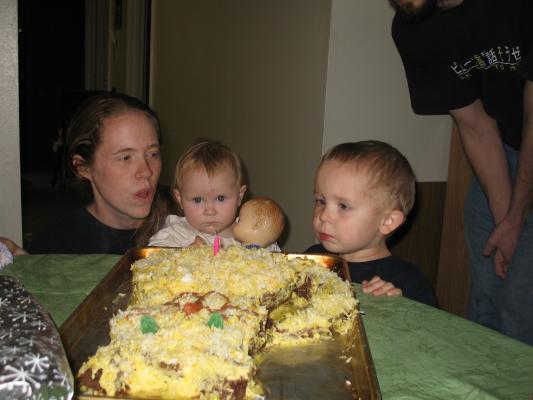 Noah blows out the candle.