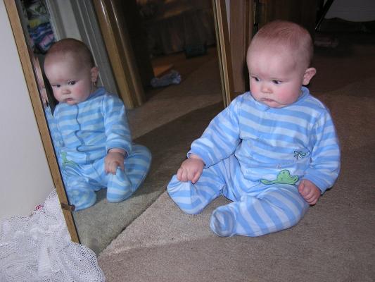 It's a baby in a mirror.