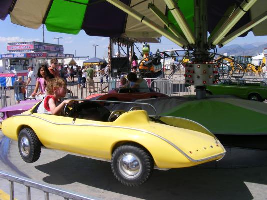 Noah drives a yellow car.