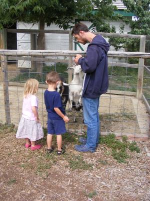 Sarah, Noah and David with the goats
