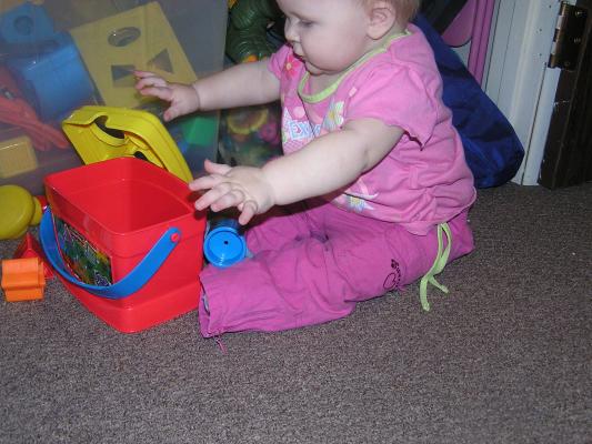 Sarah plays with her new shapes.