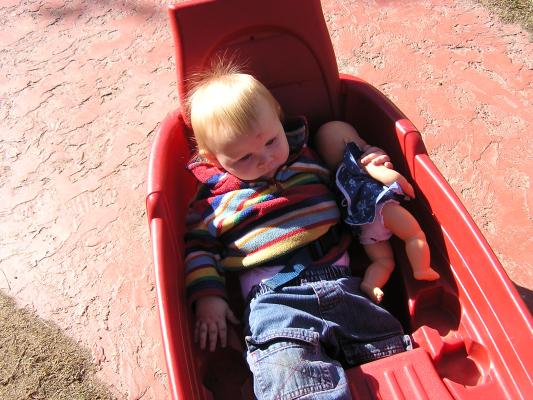 Sarah in the wagon.