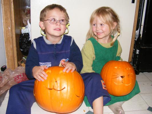 Noah and Sarah with their Jack-o-lanterns.