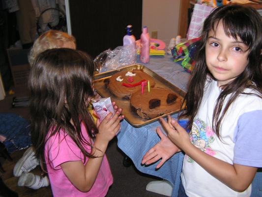 Andrea and Malia get ready to blow out Noah's candles.