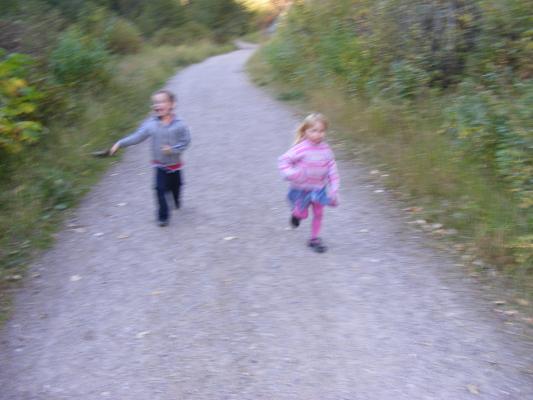 Noah and Sarah running on the trail