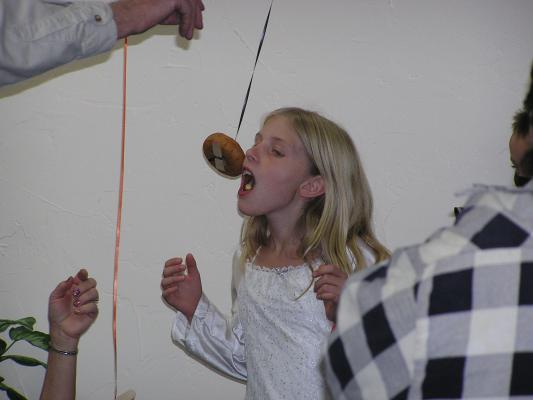 GVCC Fall Party - Doughnuts on strings.