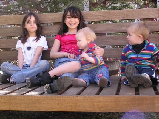 Andrea, Malia, Sarah and Noah on the bench.
