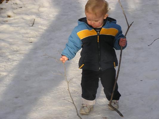Noah takes his two sticks down the trail at East Gallatin Recreation Area