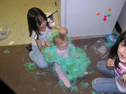 Let's cover Sarah with Easter grass.