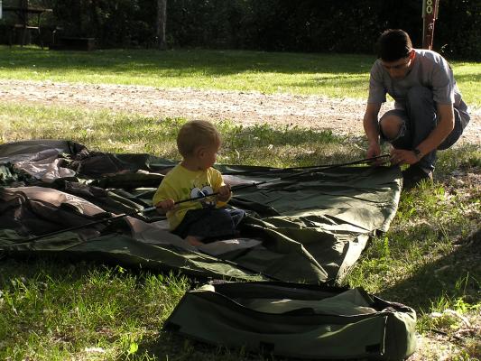 David and Noah put up the tent.