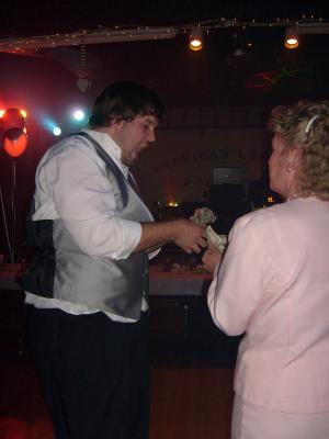 Zach gets money for the dollar dance