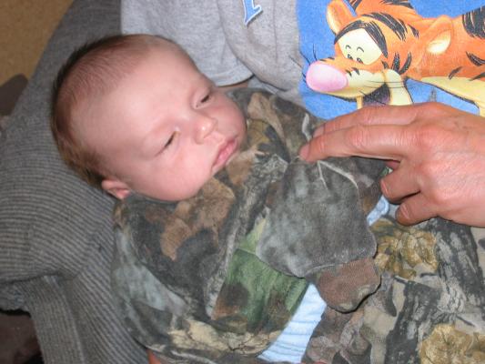 Bea hold baby Jonathan.